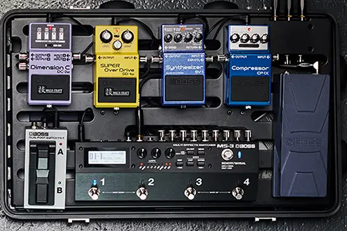 Guitar pedalboard with individual stompbox effects pedals
